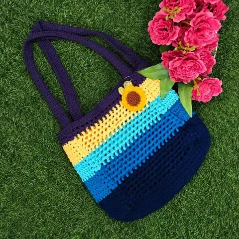Striped crochet tote bag with sunflower keychain