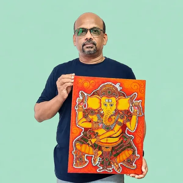 Dr. Baburaj with his Ganapathi mural