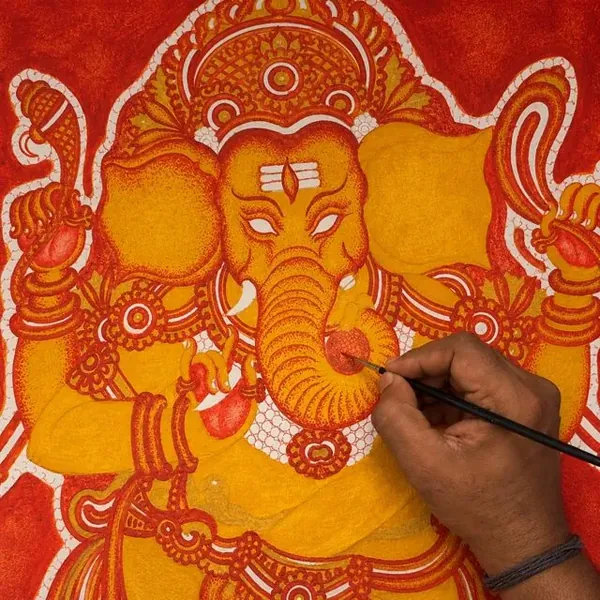 Painting the first colour layers of a Ganesha mural